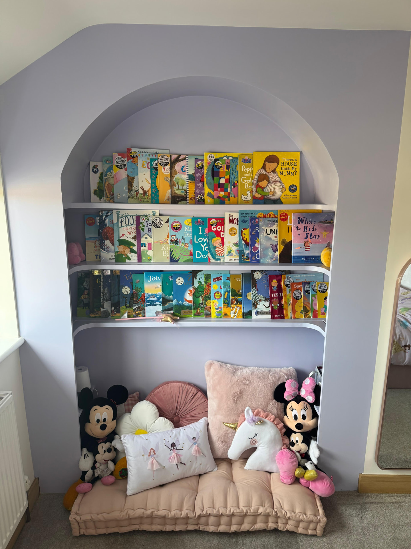 Project Flitwick, completed arched shelving unit with books and soft toys